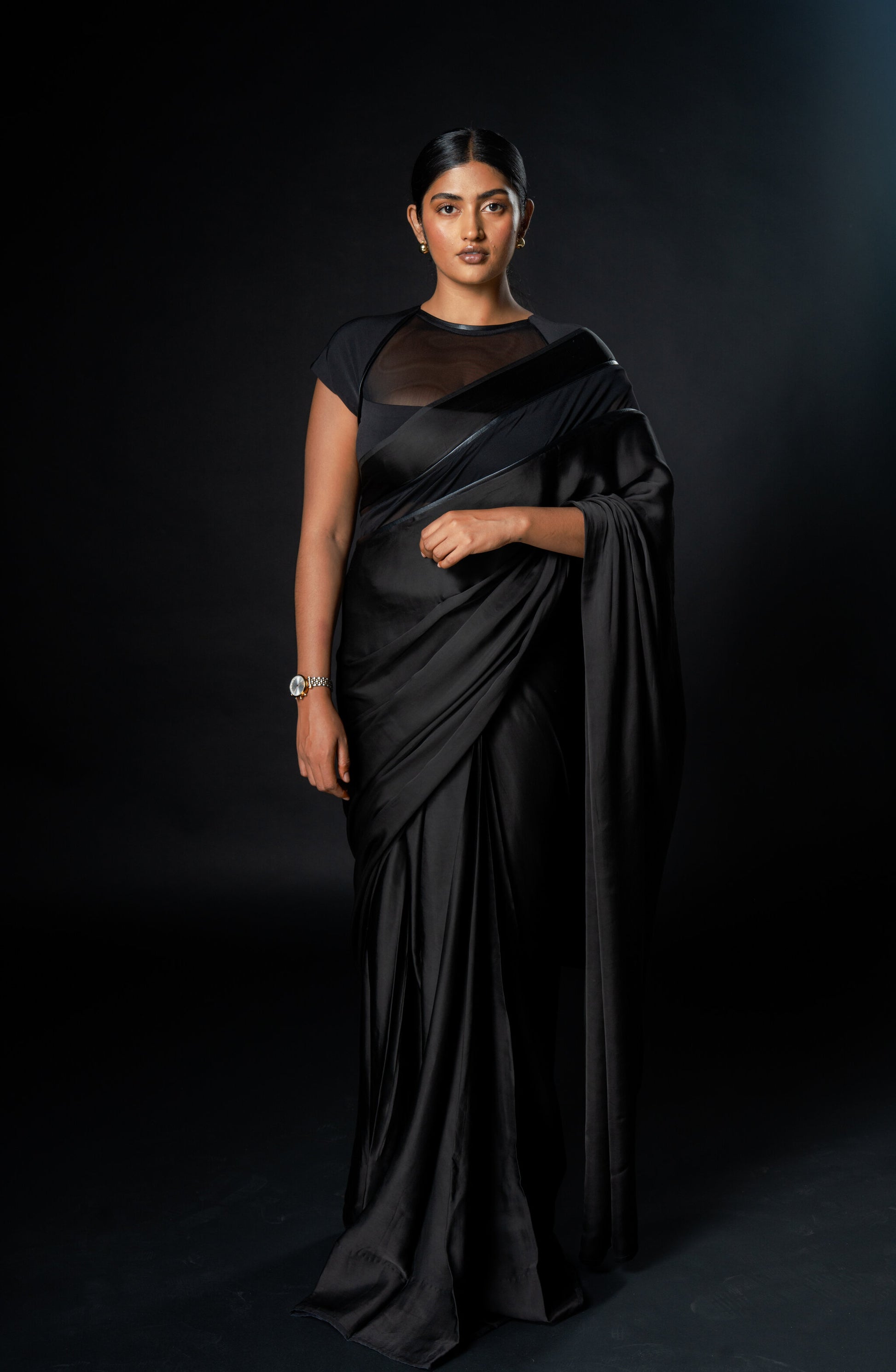 Rebel Roots Capsule black saree. Easy to wear. Pre-stitched. Short Sleeve blouse in net. Perfect for cocktail parties