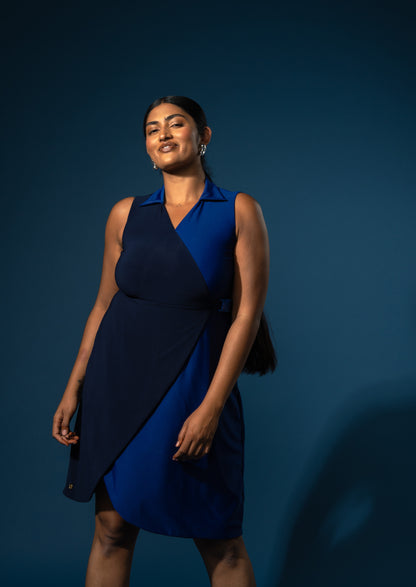 Woman wearing a blue dress against a dark blue background