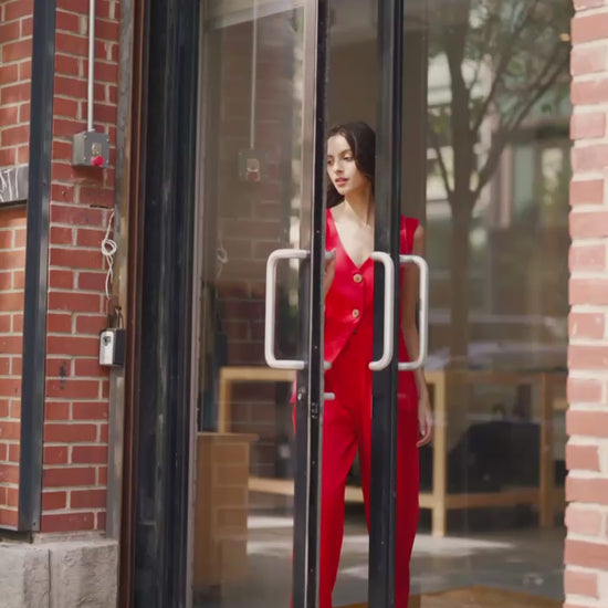 Woman in Rebel Roots Red Capsule Power Set (Coord Set with Waistcoat on Top and a Pants on the bottom) for a breezy day